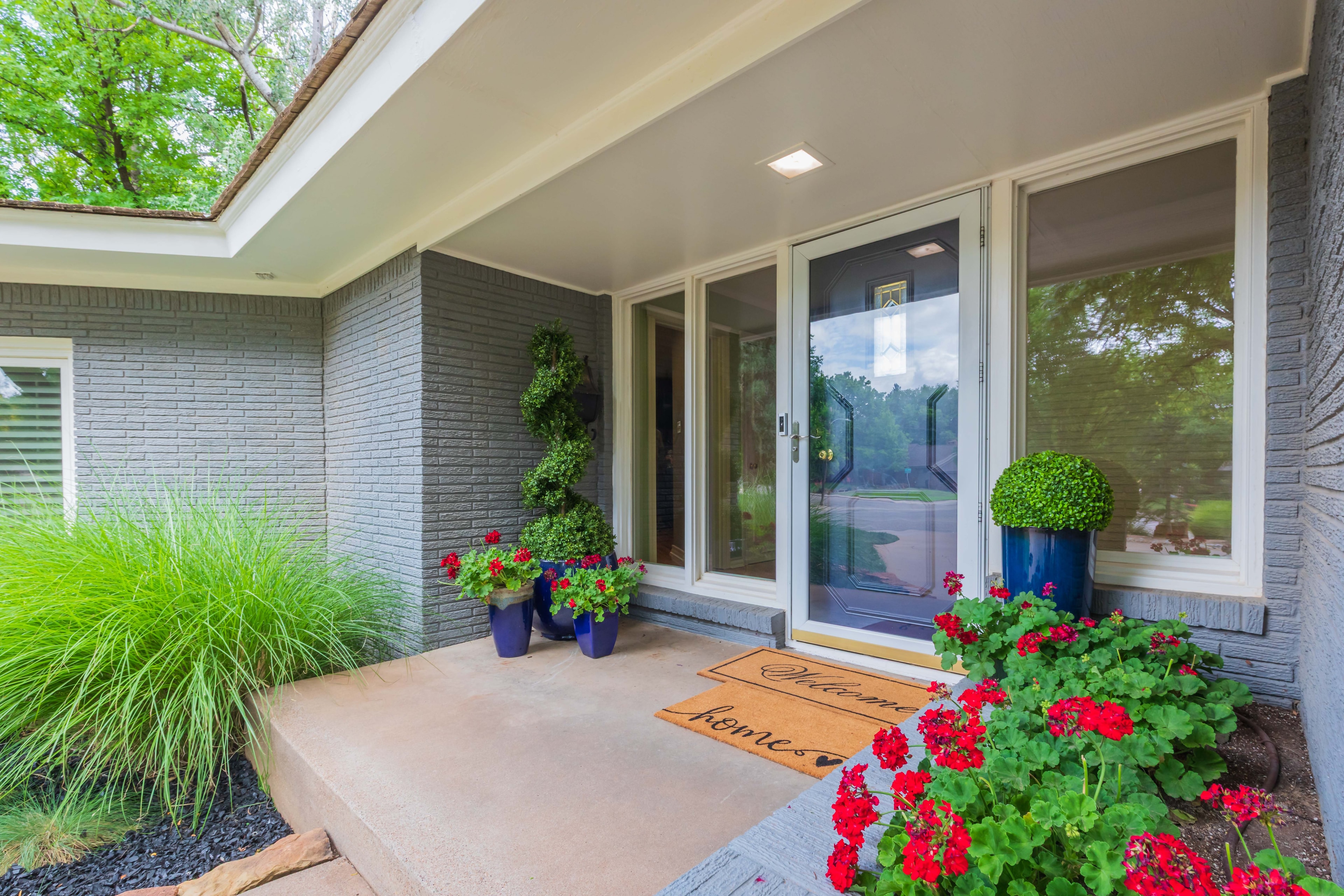 Staged living room with geraniums — sold in 5 days
